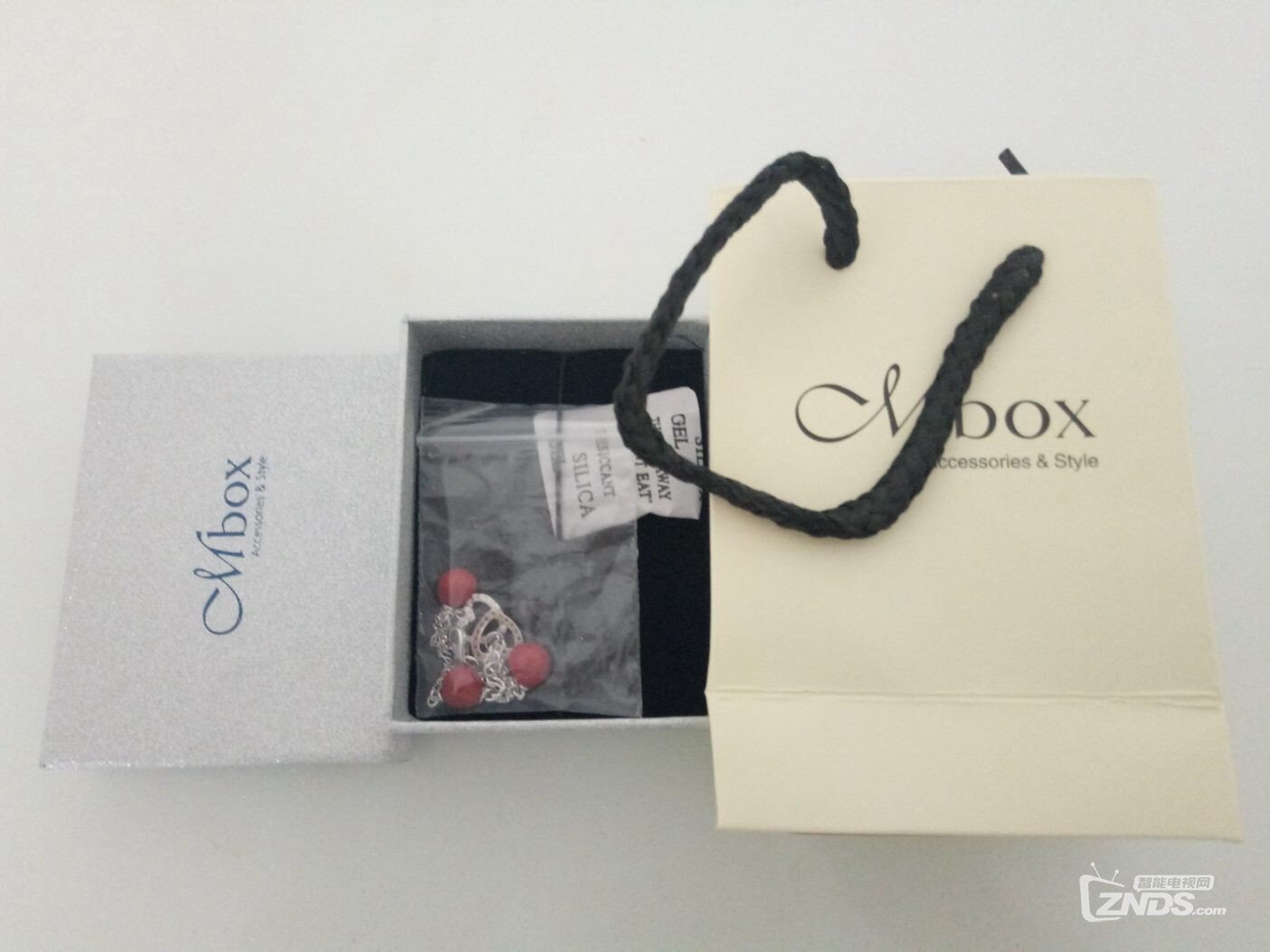 唯品会TV购携手当贝送豪礼！名牌包包等你抢！红豆手链收...